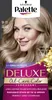 A woman with blonde hair is shown in a marketing image for hair dye. The product packaging is partially visible at the bottom. Podgląd zdjęcia produktu