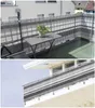 A collage showing two views of a balcony with a privacy screen installed. The top image shows a table and chair on the balcony, with the privacy screen in the background. The bottom image shows a close-up of the privacy screen attached to the balcony raili Produktbild-Vorschau