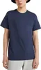 A man wearing a navy blue t-shirt. Voir les images du produit