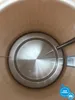 Close-up view of the inside of a kettle, showing the heating element and the interior surface. Náhľad obrázku produktu