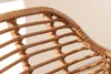Close-up of the woven texture of a brown rattan chair. Produktbild-Vorschau