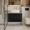 A modern bathroom with a black vanity, white vessel sink, and wooden countertop. Produktbild-Vorschau