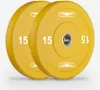 Two yellow weight plates with a silver center hole, placed side-by-side on a light gray background. Produktbild-Vorschau