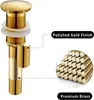 A close-up diagram of a gold-colored drain assembly for a sink, with callouts highlighting its polished gold finish and premium brass material. Produktbild-Vorschau