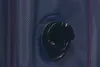 A close-up view of a valve on a blue fabric surface. Anteprima dell’immagine prodotto