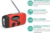 A red and black multi-functional emergency radio with a flashlight and antenna, shown with feature callouts. Produktbild-Vorschau
