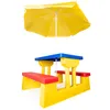 A colorful children's picnic table with benches and a yellow umbrella, isolated on a white background. Produktbild-Vorschau