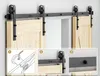 A sliding door hardware system installed above a doorway with three inset images showing installation details. Produktbild-Vorschau