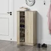 A shoe cabinet with doors and shelves filled with shoes, placed in a hallway next to a door and a clock. Produktbild-Vorschau