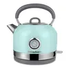 A mint-colored electric kettle with a built-in thermometer and a gray handle, shown on a white background. Voir les images du produit