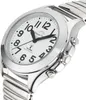 A close-up, angled shot of a silver analog watch with a white face and black numbers and hands. Podgląd zdjęcia produktu