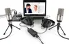 A podcasting setup with two microphones, headphones, a mixer, and a laptop displaying a video call. Produktbild-Vorschau