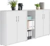 A white cabinet with multiple doors and shelves, decorated with plants and decorative objects. Produktbild-Vorschau