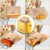 A collage of images showing toaster bags with various foods like sandwiches, pizza, and french fries, along with a yellow toaster. Produktbild-Vorschau