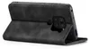 A black flip case for a smartphone is shown from the side, propped open. Produktbild-Vorschau