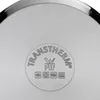 A close-up view of the bottom of a metal pan, showing brand and technical markings. Produktbild-Vorschau