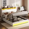 A modern bedroom with a white upholstered bed frame featuring built-in storage and LED lighting. Náhľad obrázku produktu