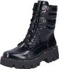 A black patent leather boot with a thick platform sole and colorful stitching. Anteprima dell’immagine prodotto