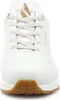A close-up front view of a white Skechers sneaker with gold accents and a gum sole. Náhled obrázku produktu