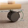 Close-up of a caster wheel on a carpet, showing its locking mechanism and 360-degree rotation feature. Produktbild-Vorschau