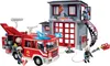 A Playmobil fire station with a fire truck and figures. Produktbild-Vorschau