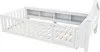 A white wooden children's bed with a house-shaped headboard and built-in shelving. Produktbild-Vorschau