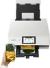 A white Canon PIXMA TS8751 WLAN color multifunction photo printer is shown with a smartphone displaying a colorful image in the foreground. Podgląd zdjęcia produktu