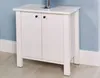 A white bathroom vanity cabinet with two doors, positioned against a light blue wall and white baseboard. Produktbild-Vorschau