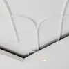 A close-up view of a white ceiling with decorative molding. Náhľad obrázku produktu