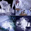 A collage of four images showcasing string lights in various decorative settings. Voir les images du produit