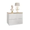 A white, high-gloss bedside table with gold trim, featuring a bust and a lamp on top. Produktbild-Vorschau