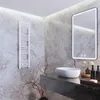 A modern bathroom with a marble-tiled wall, a white towel warmer, a floating vanity with a vessel sink, and a backlit mirror. Náhled obrázku produktu