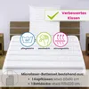 A bed with a mattress and pillow, featuring icons and text highlighting product features. Produktbild-Vorschau