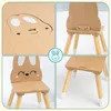A collage of four close-up images showing different angles and details of a wooden children's chair with a bunny design. Produktbild-Vorschau