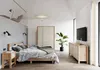 A modern bedroom with a bed, wardrobe, dresser, and TV. Produktbild-Vorschau