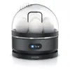 A modern gray egg cooker with clear dome lid, containing white eggs. Produktbild-Vorschau