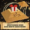 A wooden pyramid puzzle box with a gift inside, surrounded by confetti and golden arcs. Podgląd zdjęcia produktu