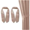 Two curtain tie-backs are shown on the left, and a curtain tie-back is shown attached to a curtain on the right. Náhľad obrázku produktu