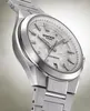 A close-up, angled shot of a silver wristwatch with a white, textured dial. Produktbild-Vorschau