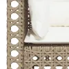 Close-up view of a beige poly rattan sofa with white cushions. Produktbild-Vorschau
