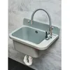 A gray sink with a flexible gray faucet mounted on a gray concrete wall. Anteprima dell’immagine prodotto
