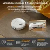 A white robot vacuum cleaner is shown on a carpet and a hard floor, with text overlays describing its features. Produktbild-Vorschau