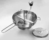 A stainless steel food mill with a separate sieve on a light gray background. Podgląd zdjęcia produktu