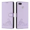 A purple flip case for a phone, shown open and closed, with a cat illustration. Produktbild-Vorschau