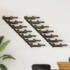 Two black metal wine racks mounted on a white wall, each holding multiple wine bottles. Podgląd zdjęcia produktu