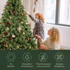 A mother and child decorating a Christmas tree. Produktbild-Vorschau