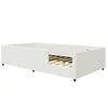 A white upholstered bed frame with a slatted base is shown from a side angle against a white background. Anteprima dell’immagine prodotto