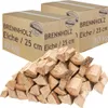 Two cardboard boxes of firewood with a pile of chopped wood in front. Náhľad obrázku produktu