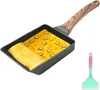 A rectangular non-stick egg pan with a wooden handle, containing a partially cooked omelet with vegetables, and a spatula next to it. Náhľad obrázku produktu