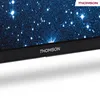 A close-up of a television screen displaying a starry night sky, with the brand logo visible on the bezel. Anteprima dell’immagine prodotto